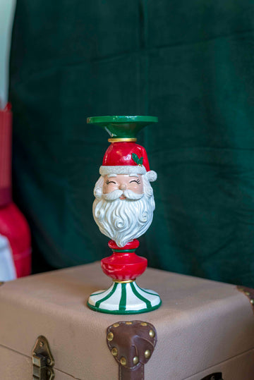 Babbo Natale porta candela