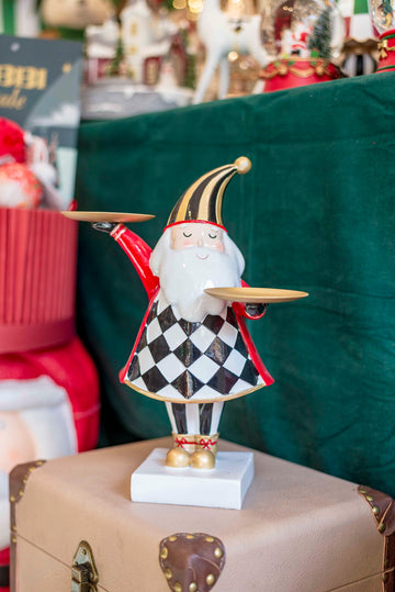 Babbo Natale porta candela a scacchi